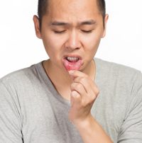 Man with Canker Sore on Lip